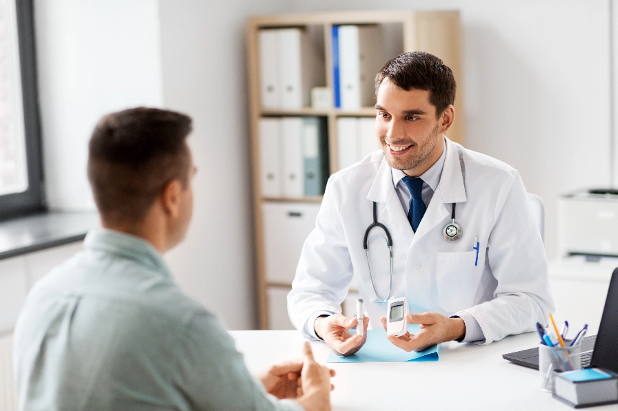 man speaking to pharmacist