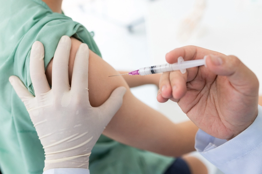 woman getting immunization