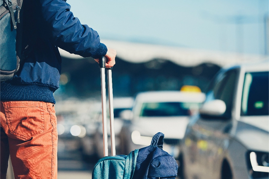 person traveling with suitcase